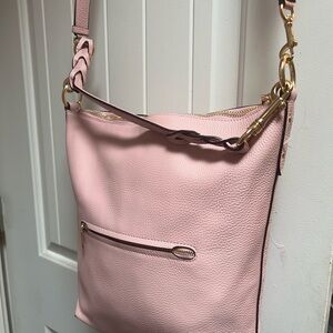 New without tag Coach hand bag in pastel pink